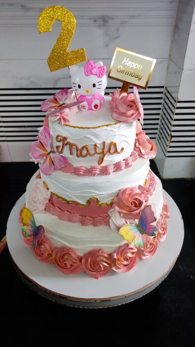 Kitty theme cake in pineapple flavour