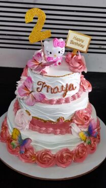Kitty theme cake in pineapple flavour